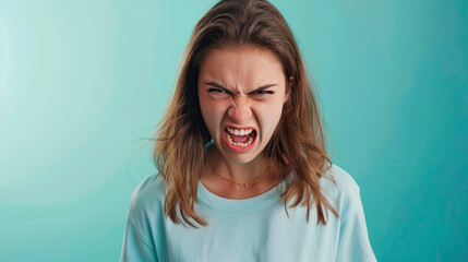 Furious woman on pastel blue background