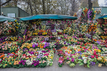Shops with flowers and candles on Wolski Cemetery before All Saints Day in Warsaw cityk, Poland