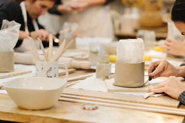 Clay Creations: Female Friends Shaping Vases Together