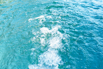 A stream of sprayed water fills the pool with clean water and filters it. Pool cleaning process. Preparing for the summer season. Smart home technologies