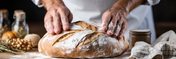 Foto op Canvas Male hands baking bread on blurred white kitchen background with copy space for text © chelmicky