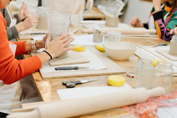 Artisan Workshop: Middle-Aged Friends Crafting Clay