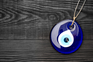 Big evil eye bead on vintage  background