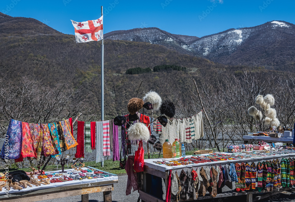 Canvas Prints Souvenirs for sale next to Ananuri Castle over the Aragvi River in Dusheti Municipality, Georgia