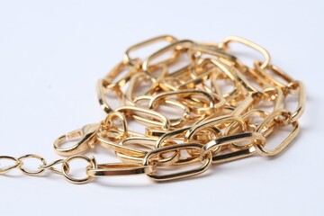One metal chain on white background, closeup. Luxury jewelry