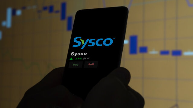 March 12th 2024 Houston, Texas. The logo of Sysco on the screen of an exchange. Sysco price stocks, $SYY on a device.