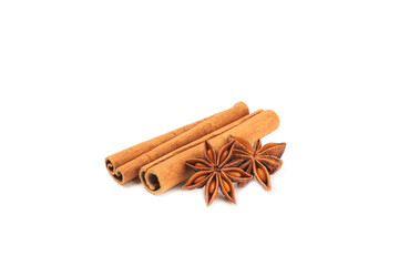 Cinnamon sticks and anise isolated on white background. Cinnamon roll and star anise. Spicy spice for baking, desserts and drinks. Fragrant ground cinnamon.