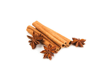Cinnamon sticks and anise isolated on white background. Cinnamon roll and star anise. Spicy spice for baking, desserts and drinks. Fragrant ground cinnamon.