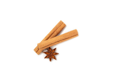 Cinnamon sticks and anise isolated on white background. Cinnamon roll and star anise. Spicy spice for baking, desserts and drinks. Fragrant ground cinnamon.