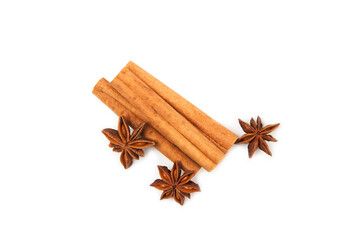 Cinnamon sticks and anise isolated on white background. Cinnamon roll and star anise. Spicy spice for baking, desserts and drinks. Fragrant ground cinnamon.