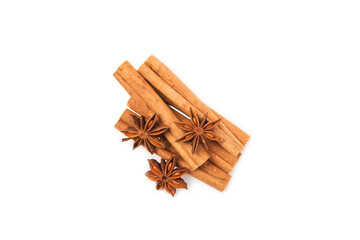Cinnamon sticks and anise isolated on white background. Cinnamon roll and star anise. Spicy spice for baking, desserts and drinks. Fragrant ground cinnamon.
