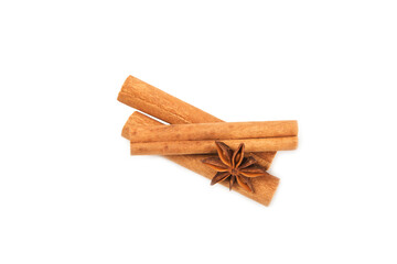 Cinnamon sticks and anise isolated on white background. Cinnamon roll and star anise. Spicy spice for baking, desserts and drinks. Fragrant ground cinnamon.