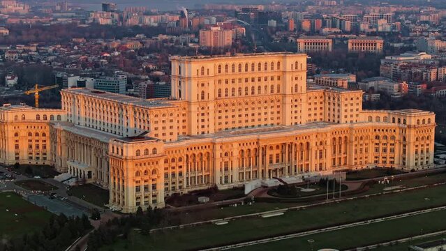 Aerial drone view of Palace of the Parliament in Bucharest downtown at sunset. Romania