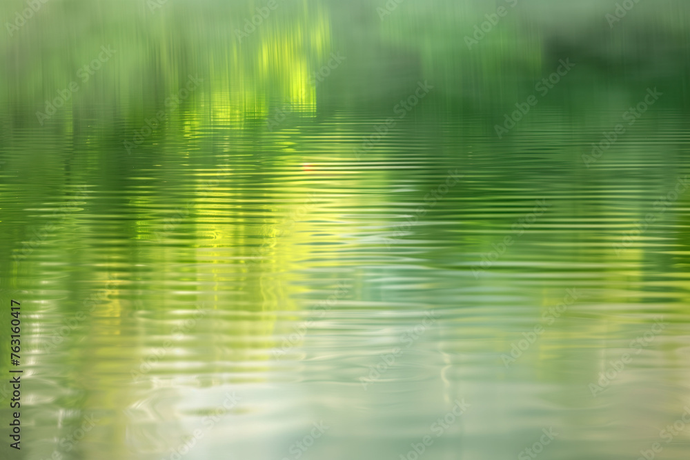Aufkleber beautiful green reflections on water surface. background image. created with generative ai technolog