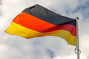 Official National Country Flag of Germany at Cloudy Sky