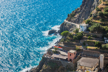 Aerial view of cliff with terrace by the sea and pathway on the hill, Riomaggiore ITALY