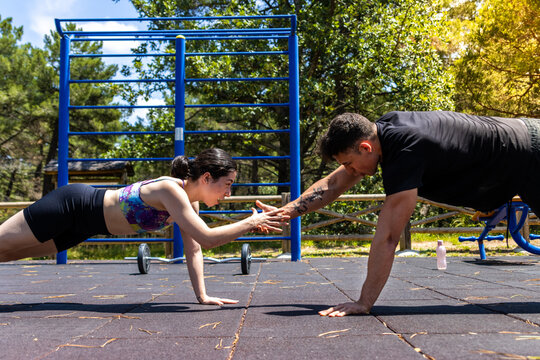 Personal training teamwork with push-up challenge