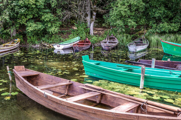 Boats on the Wigry Lake in Wigry National Park, view from a shore near Slupie and Gawrych Ruda...