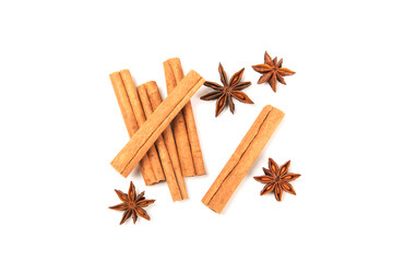 Cinnamon sticks and anise isolated on white background. Cinnamon roll and star anise. Spicy spice for baking, desserts and drinks. Fragrant ground cinnamon.