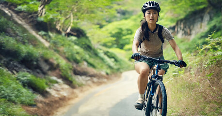 スポーツバイクのサイクリスト／自転車に乗る女性 - obrazy, fototapety, plakaty