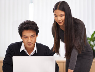 Teamwork, mentor and help with laptop in office or businessman learning from support of woman....