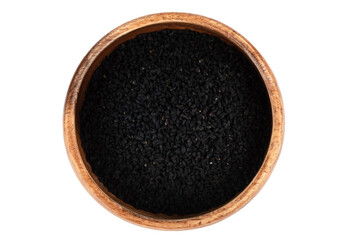 Top view of wooden bowl with black sesame seeds on white background.