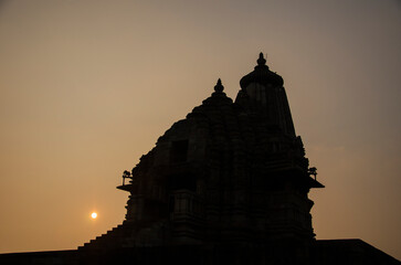 Silhouette of Vamana temple during Sunset, Khajuraho, Madhya Pradesh, India, Asia. 