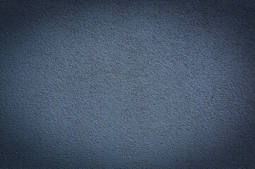Beautiful decorative dark blue plaster on the background of the wall. 1