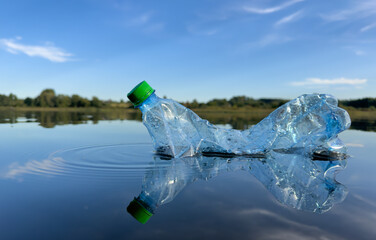 Marine plastic pollution. Plastic waste in lake. Microplastics groundwater poisoning. Ocean...