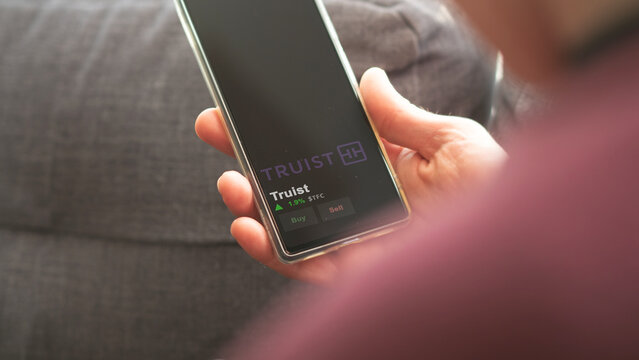 January 15th 2024. The logo of Truist on the screen of an exchange. Truist price stocks, $TFC on a device.