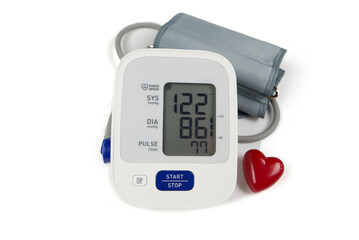 Medical electronic tonometer and red heart on a white