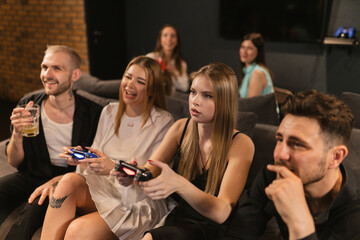Women concentration and skill demonstrate passion for gaming. Onlookers inspired by females resilience in face of adversity