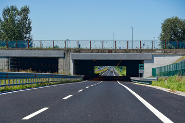 Concrete bridge with Slovenian highway near the Italian border on a sunny summer day. Photo taken August 11th, 2023, Slovenia.