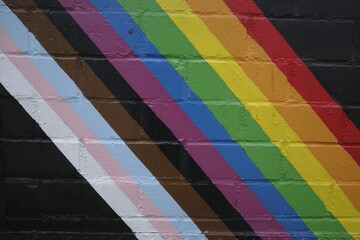 LGBT Pride flag colors on a wall