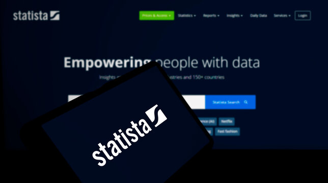 Dhaka, Bangladesh- 20 March 2024: Statista.com logo is displayed on smartphone.
