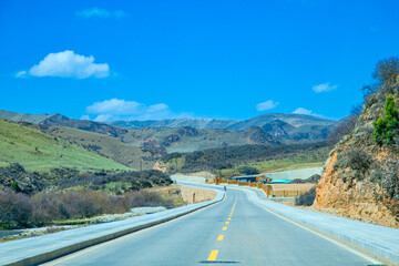 Aba Qiang and Tibetan Autonomous Prefecture, Sichuan Province - mountains and grassland scenery under the blue sky