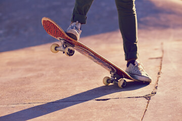 Skateboard, sneaker and person in skatepark for skate, recreation and active for game with wheels....