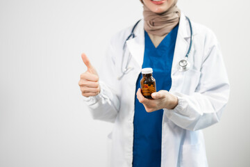  Hand in a Lab Coat and a holding a white pill bottle