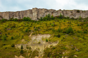 Steep rocky hills of the Bakota Bay on the Dniester river, Podilski tovtry National park, Khmelnitskiy region of Western Ukraine.