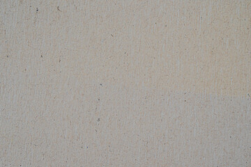 Recycled beige cardboard close up texture. Old paper background.