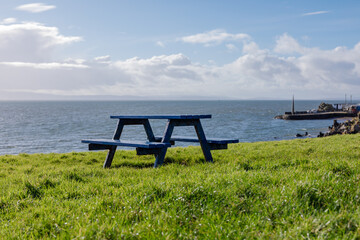 peaceful seaside bench view