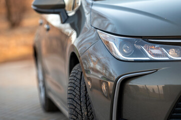 Close-up of the headlights of a modern car. Selective focus.