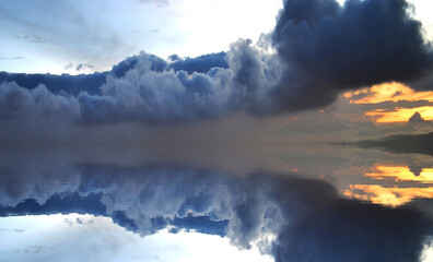 a beautiful sunset on a lake in south america