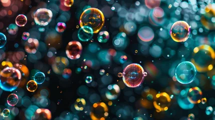 Fotobehang Isolated bubbles set against a dark background for a striking contrast  © Orxan