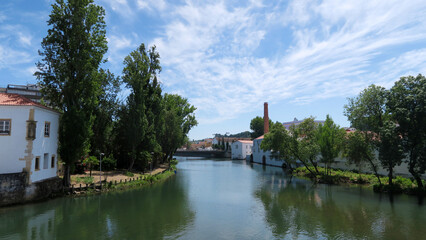 Fototapeta premium View of Rio Nabão: The Nabão river is a Portuguese tributary of the Zêzere river that passes through the city of Tomar. It rises in the municipality of Ansião, in Olhos de Água