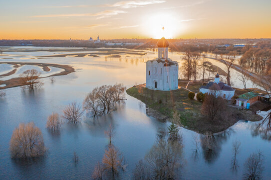 Aerial view of flooded landscape with Church of the Intercession on the Nerl, Bogolyubovskoe, Vladimir, Russia.