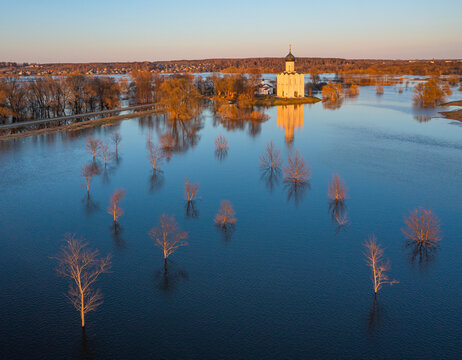 Aerial view of flooded Nerl river with Church of the Intercession on the Nerl, Bogolyubovskoe, Russia.