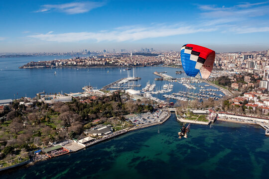 Aerial view of paramotor flying near Kalamis Marina on the Marmara Sea coast of the Asian side of Istanbul, Turkey.