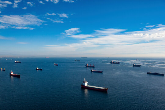 Aerial view of cargo ships anchored in the Marmara Sea waiting to enter the Bosphorus, Istanbul, Turkey.
