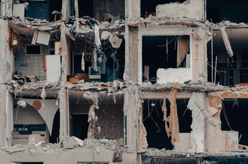 destroyed and burned houses in the city during the war in Ukraine